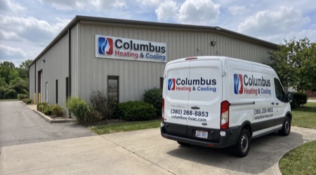 Columbus Heating & Cooling office showroom with reception desk and HVAC equipment